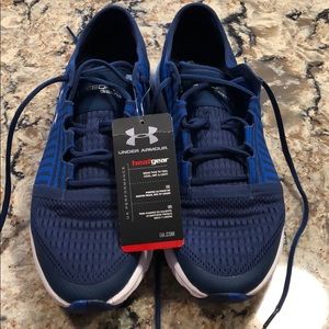 Men’s Under Armour sneakers.